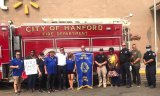 Lions Club members join Assemblyman Rudy Salas as they "Stuff the Bus" for school supplies for Kings County students.